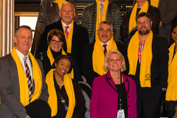 MAPSA President Dan Quisenberry and 2019 CMAD attendees pose in the MI Capitol with a legislator. 