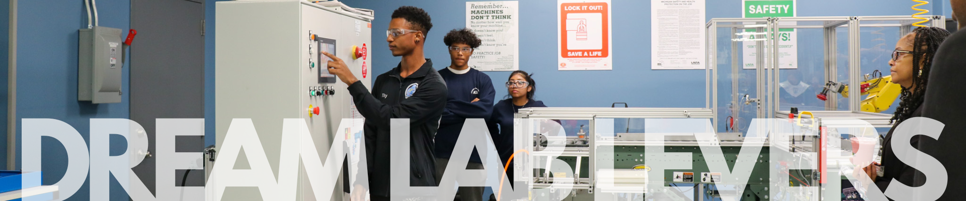 High school student using machinery in classroom High school student using machinery in classroom