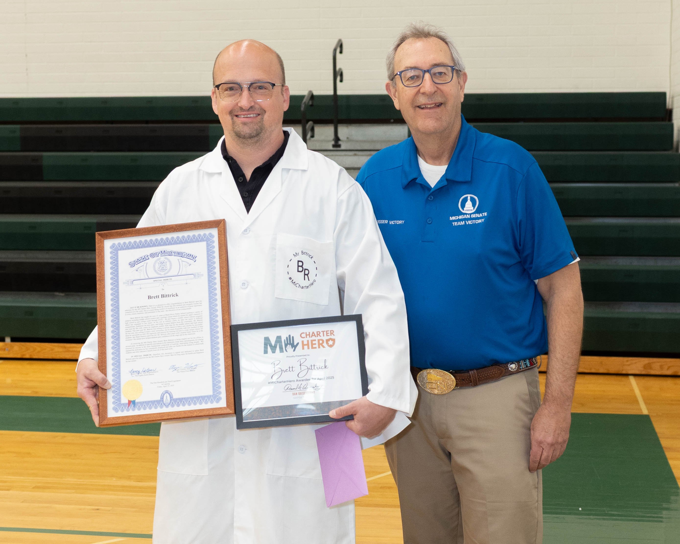 Brett Bittrick and Senator Roger Victory at the #MiCharterHero award ceremony