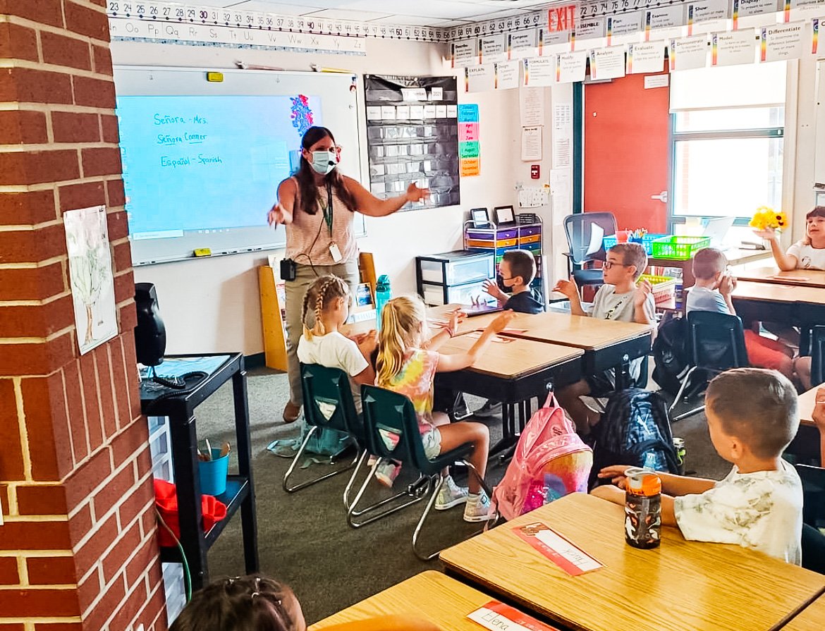 A teacher at Chatfield School teachers to her class during the first day of school. 