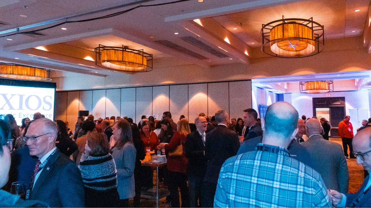 Attendees networking at the MAPSA Social