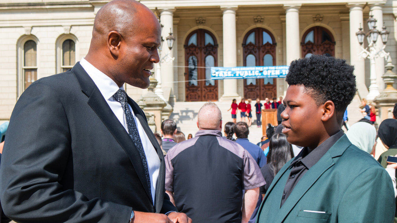 Young student meeting a Michigan Lawmaker