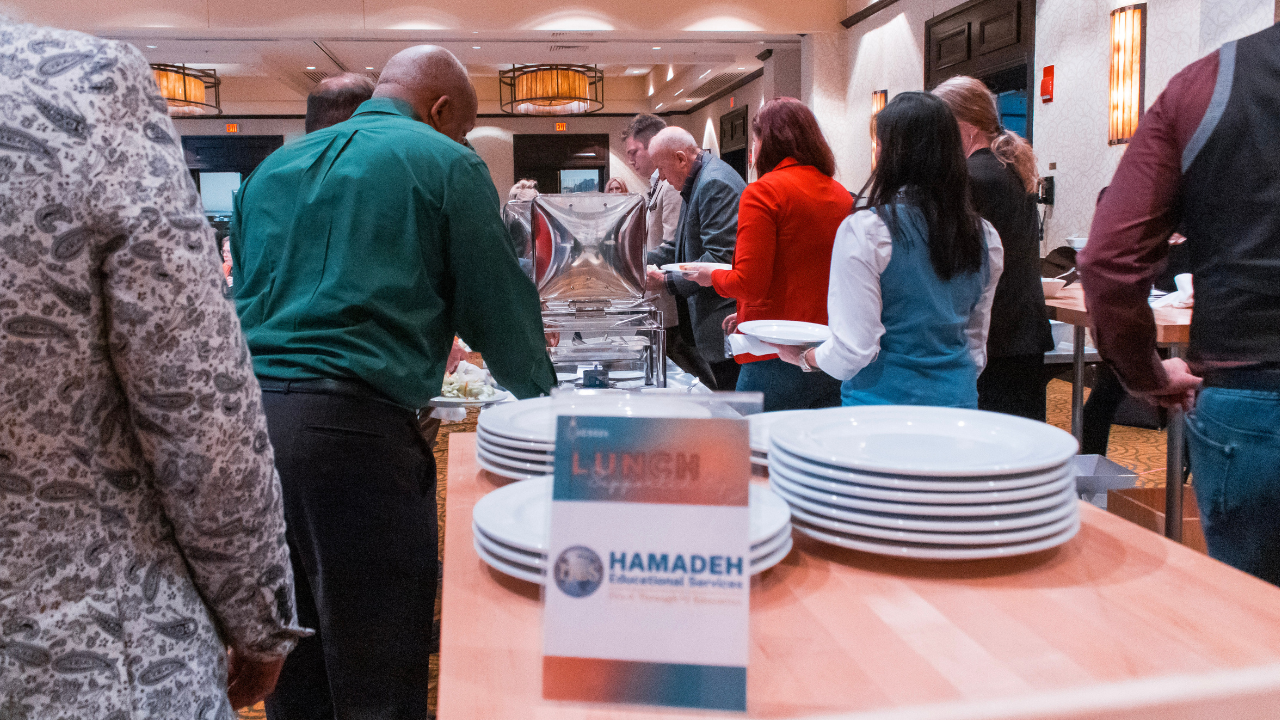 Attendees getting lunch at Symposium