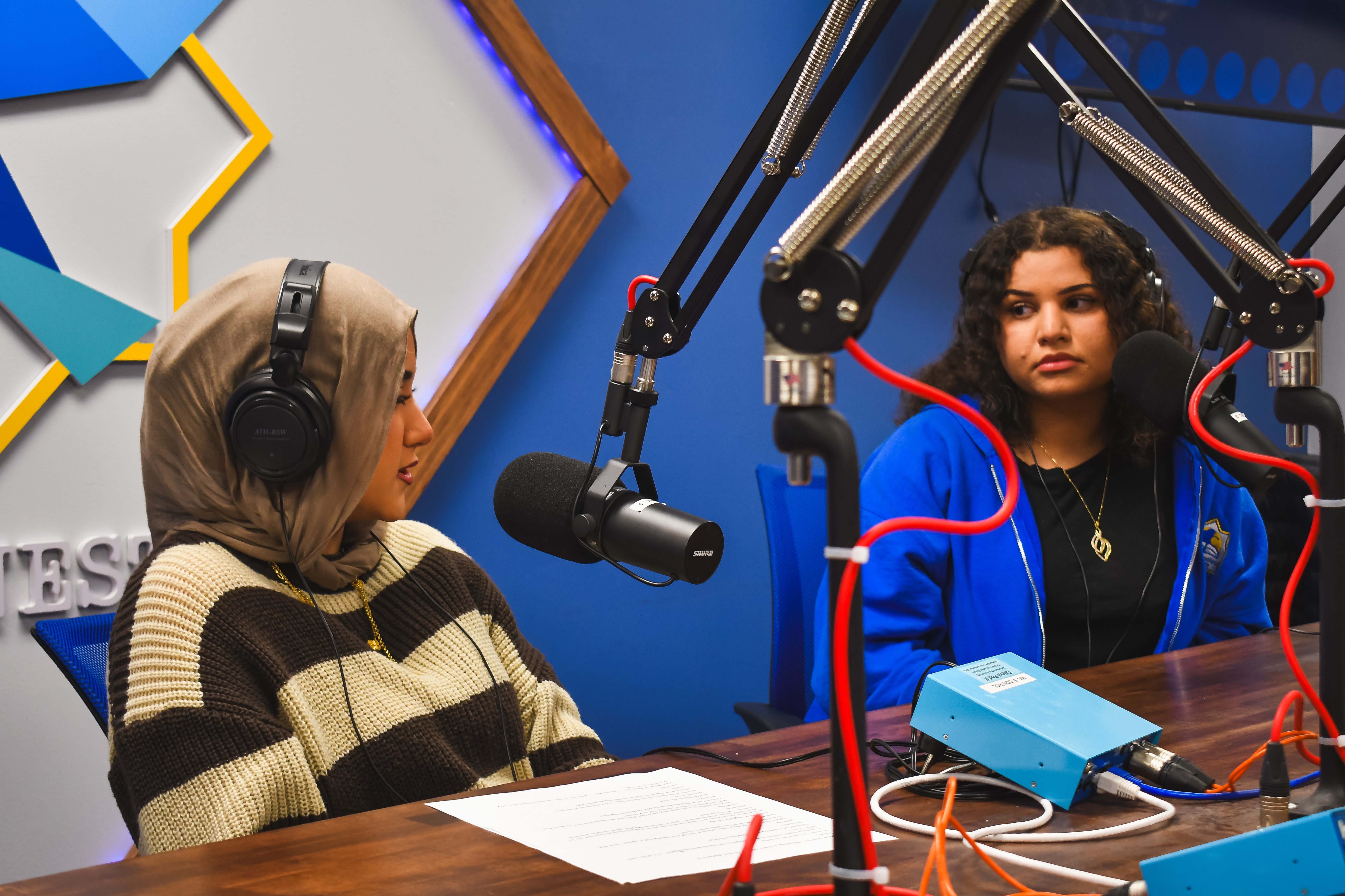 Two Arab American female students on a podcast