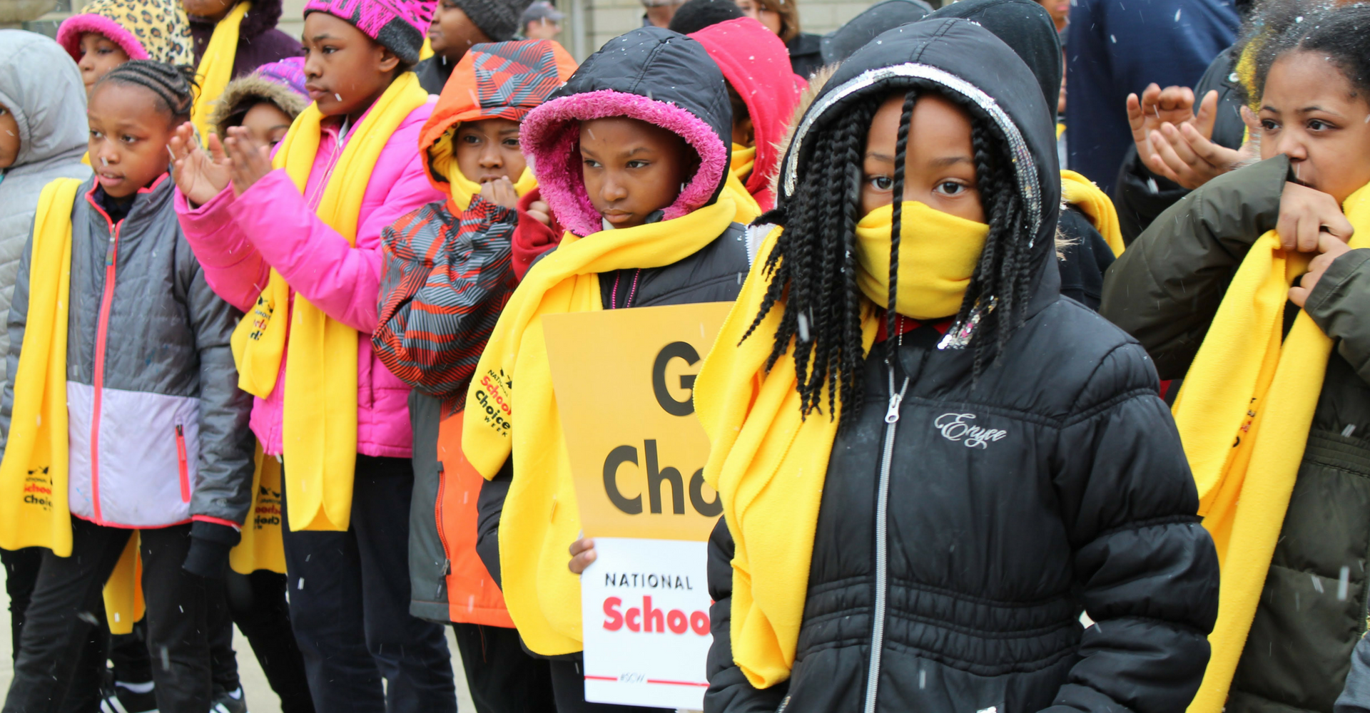 A photo of several students outside the Lansing Capitol building during 2018 National School Choice Week.