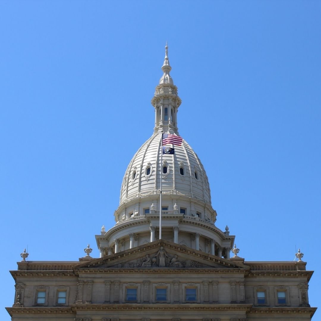 A photo of the MI Capitol building.